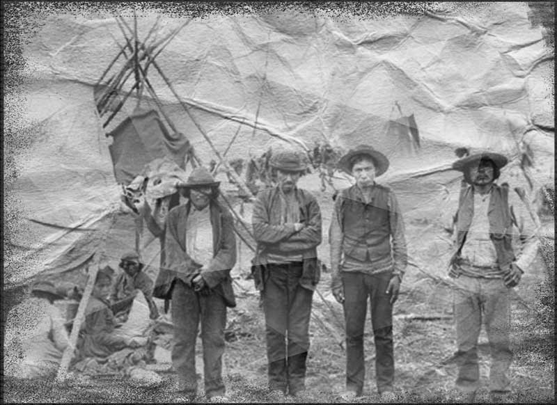 four cree indians stand on the field